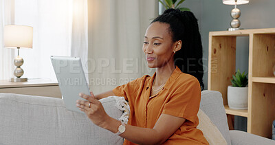 Buy stock photo Greeting, tablet and video call with young black woman on digital touchscreen while sitting on sofa of living room at home. Communication, video conference and internet with female on social media