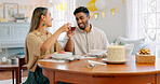 Toast, love and couple on a wine date in a house in celebration of a happy marriage and anniversary. Smile, romance and young woman drinking alcohol and eating spaghetti food with a romantic partner