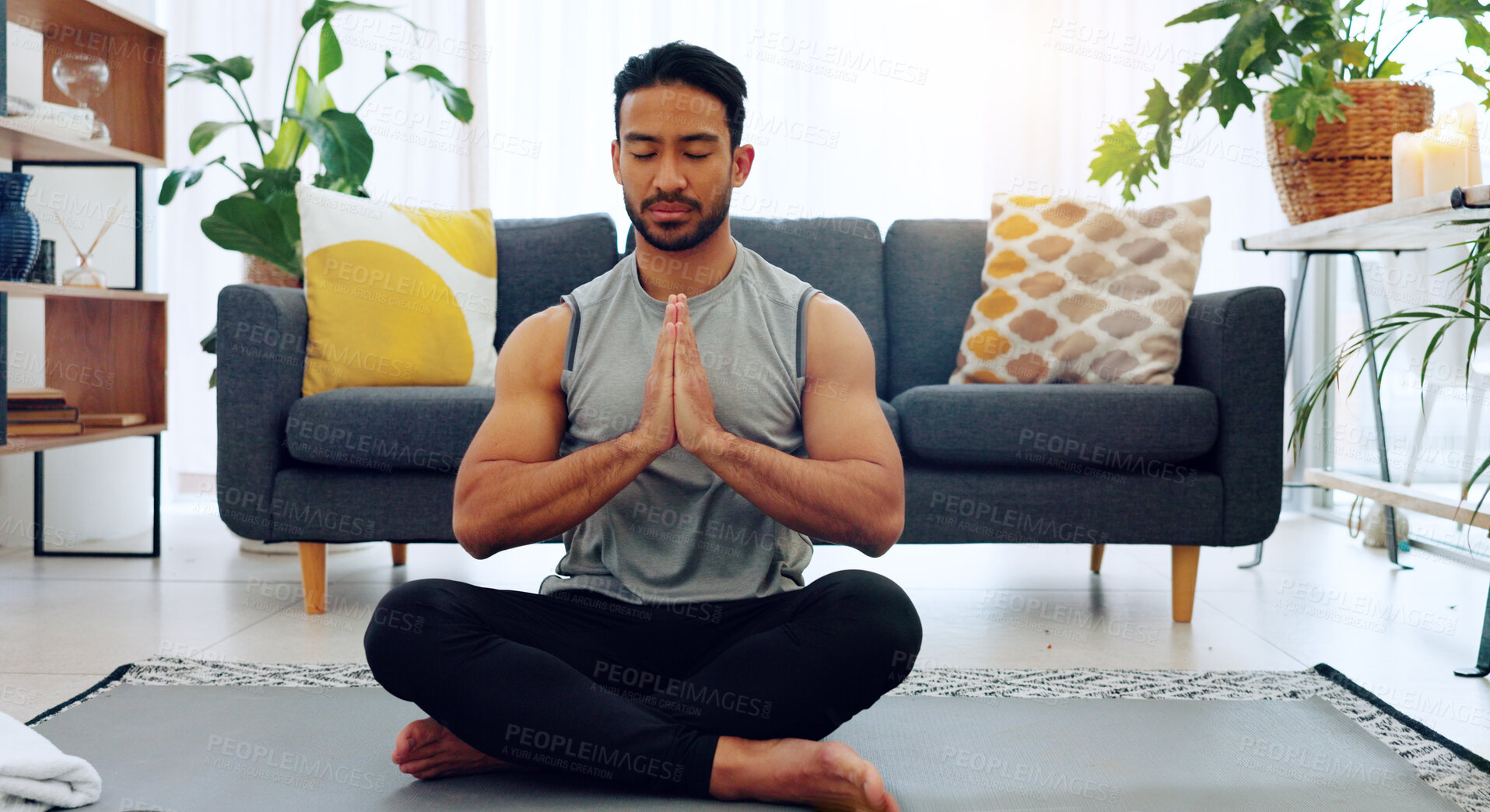 Buy stock photo Man, meditation and yoga for lotus, home and peace with silence for wellness, relax and spiritual growth. Asian guy, zen and mindfulness for chakra balance, health and floor in living room at house