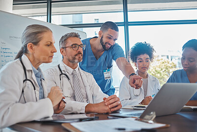 Buy stock photo Teamwork, diversity and doctors in a meeting planning a surgery strategy in collaboration together on laptop in an office. Medical healthcare workers in conversation about cardiology report review