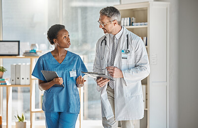 Buy stock photo Hospital doctor and student nurse communication in office for information on patient record. Professional expert and healthcare man in conversation with nursing worker on medical diagnosis.

