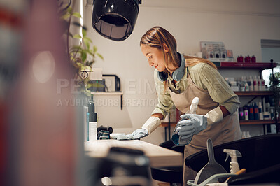 Buy stock photo Hair salon, cleaner and woman cleaning a workplace in Australia with equipment to disinfect. Housekeeper, maid or girl dusting table with hygiene, detergent and sanitizing products in beauty parlor