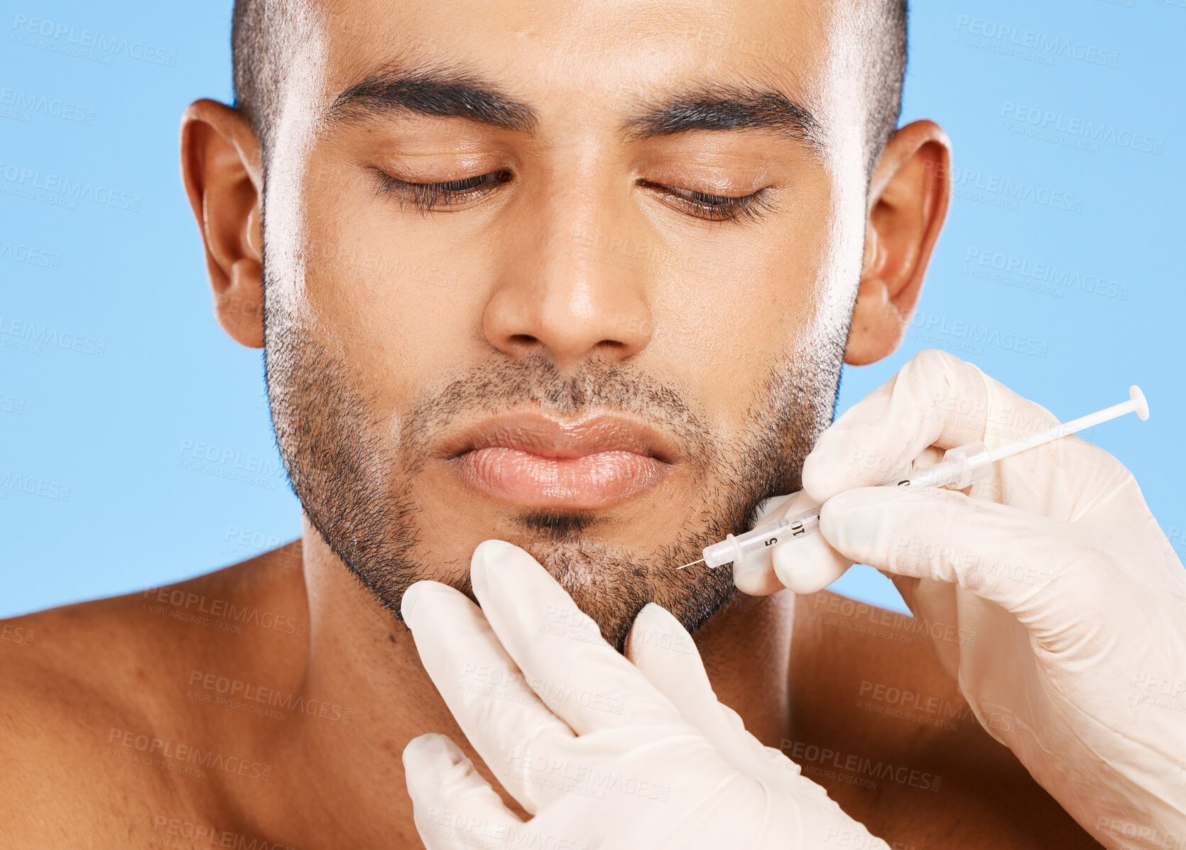 Buy stock photo Beauty, facial and needle with face of man for plastic surgery, aesthetic and skincare. Medical, prp injection and spa with model against blue background for dermatology, treatment or cosmetics filler
