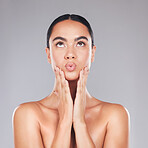 Skincare, beauty and surprise face of a woman from Spain with healthy, wellness and glowing skin. Female model hands after cosmetic, health dermatology and lip fillers treatment or plastic surgery