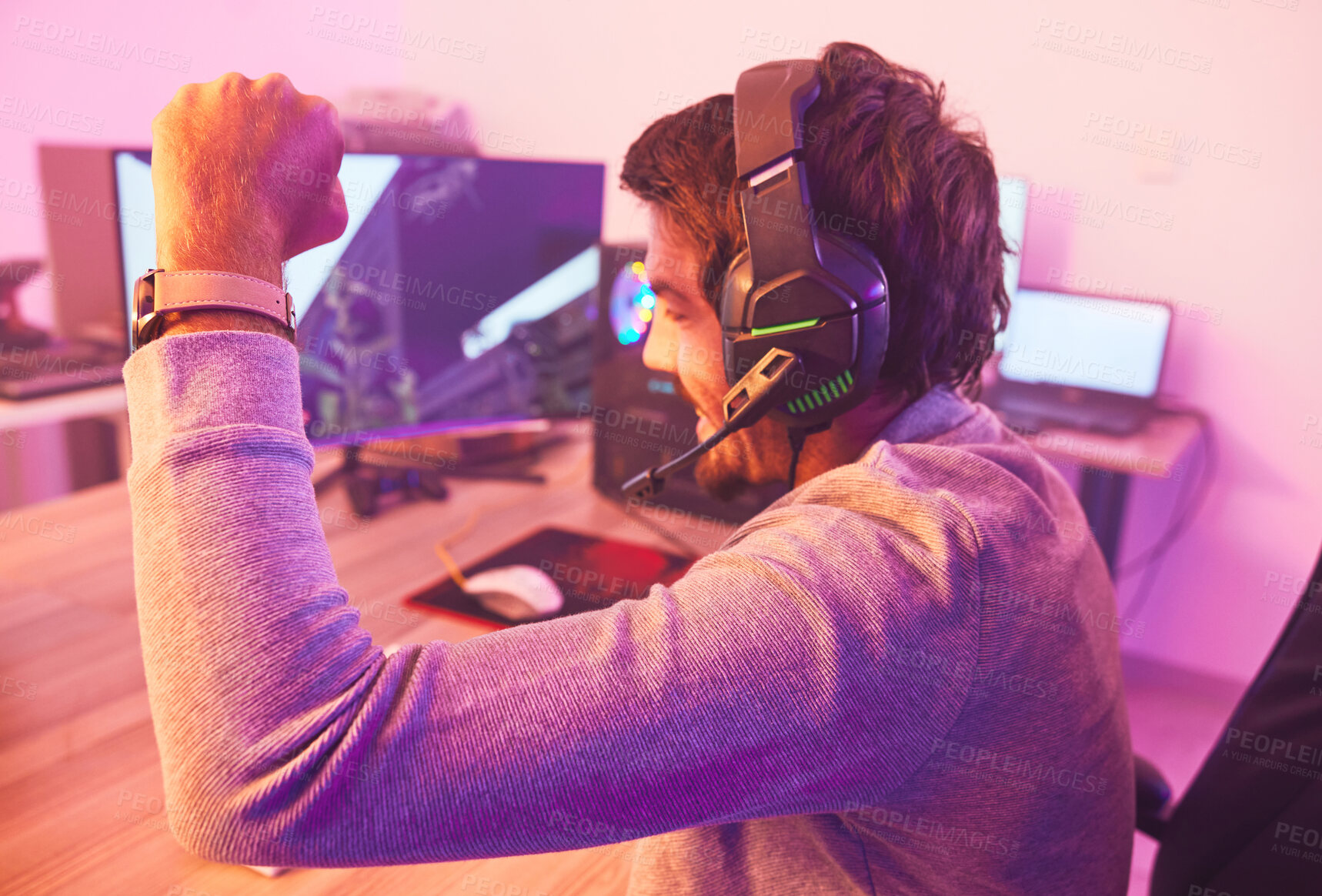 Buy stock photo Winner, fist and man on computer with microphone, celebrating game win and success. Happy male gamer, cheering or esport player celebration for online competition, excited for progress or achievement