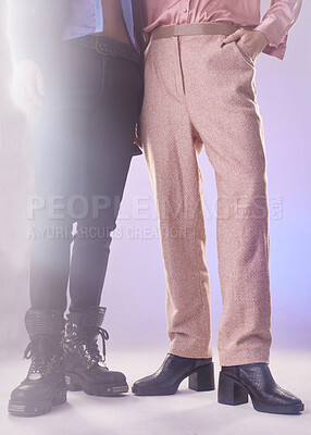 Buy stock photo Fashion, vintage and closeup of pants in a studio for a retro, trendy and stylish outfit. Style, glitter and gay men with edgy, style and elegant clothes and boots by a purple gradient background.