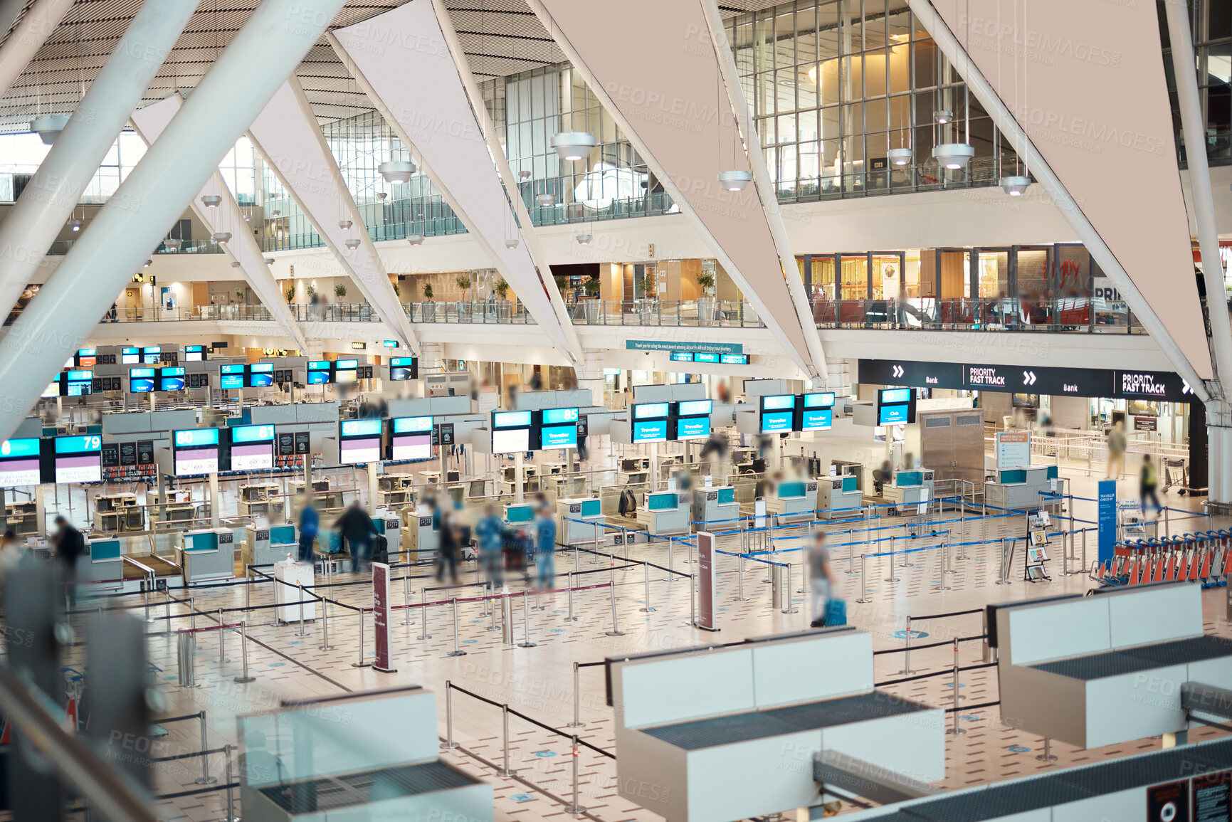 Buy stock photo Busy, moving and people in an airport for travel, check in and departure. Building, speed and crowd walking, moving and arriving or leaving for a trip, holiday or traveling for work or vacation