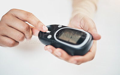 Buy stock photo Diabetes, blood test and medical with finger of woman for insulin level, monitoring and glucose check. Medicine, healthcare and digital with hands of patient and glucometer machine for sugar balance