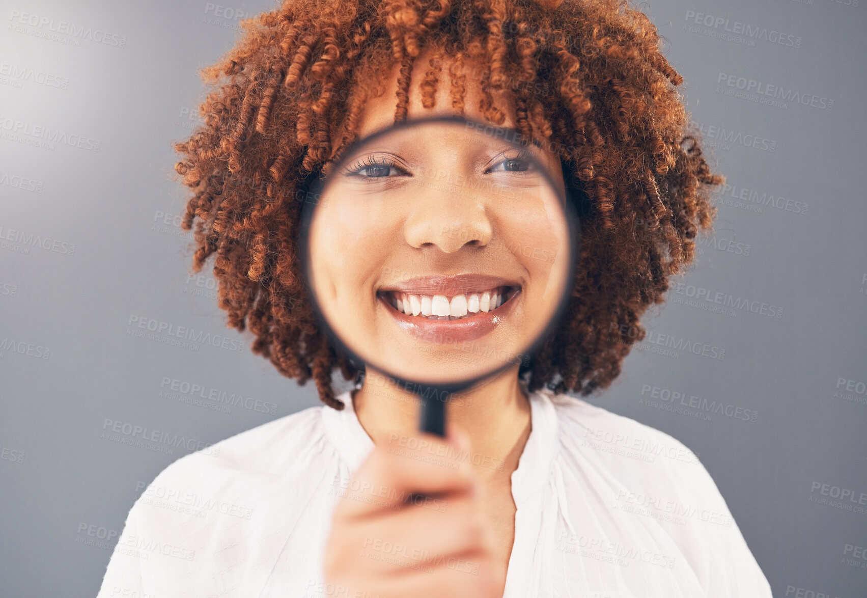 Buy stock photo Magnifying glass, focus and smile with portrait of black woman for analysis, exploration and close up. Detective, search and spy with girl and magnifier for investigation, zoom or discovery in studio