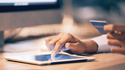 Buy stock photo Hands, tablet and credit card for ecommerce, online shopping or banking at night on office desk. Hand of employee shopper typing on touchscreen for internet purchase, bank app or transaction on table