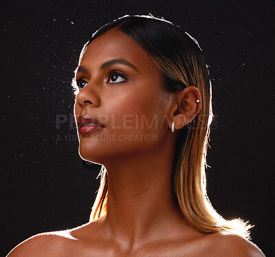 Beauty, makeup and woman in a studio with a cosmetic, self care and natural face routine. Skincare, cosmetics and female model from Brazil with a luxury facial treatment isolated by black background.