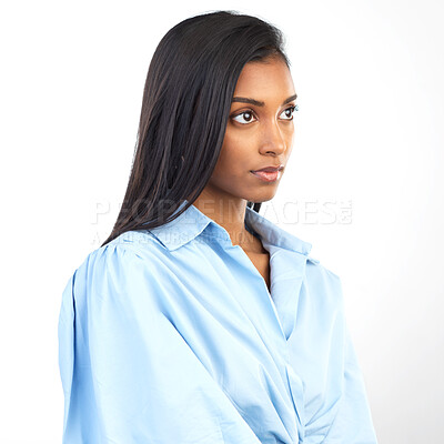Buy stock photo Serious, face and Indian woman on a white background in studio for mindset, calm attitude and thinking. Copy space, mockup and isolated confident, thoughtful and attractive girl in trendy clothes