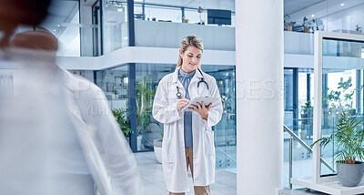 Buy stock photo Busy, woman and doctor with tablet, lobby and connection for research, online reading and healthcare. Medical professional, female employee and lady with device, telehealth and touchscreen in clinic