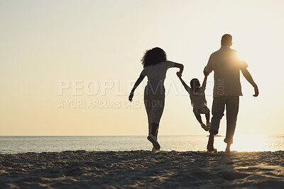 Buy stock photo Silhouette, mockup and a family on a beach, playing while having fun together by the ocean or sea. Kids, travel or love with a mother, father and child on the sand at sunset to play while bonding