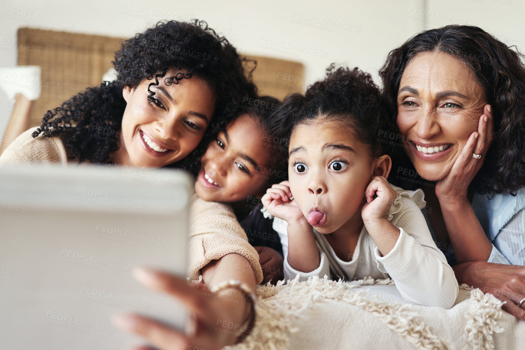 Buy stock photo Funny, black family home and selfie with mother, kids and  grandmother with happy bonding on bed. African children, mama and grandma with social media, profile picture and comic happiness with tablet