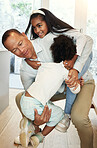 Black family, father and children with piggyback in home with hug, care and love for bonding game together. Man, girl kids and playful with funny, comic and happy game with welcome in house together