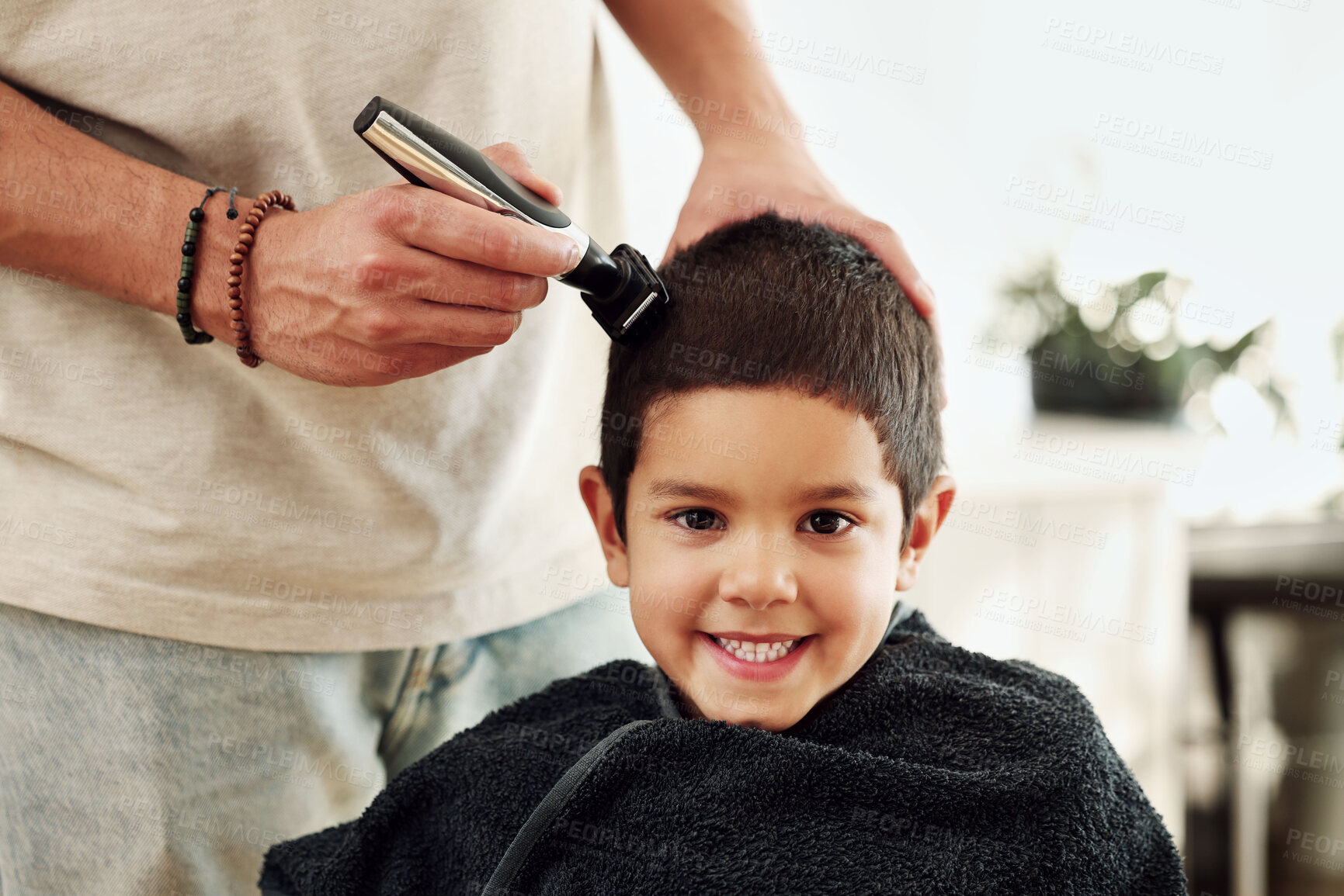 Buy stock photo Portrait, kid and shaving hair at barber for grooming, cleaning and trim. Smile, face and happy boy or child getting a haircut with electric shaver of hairdresser at salon for new look and hairstyle.