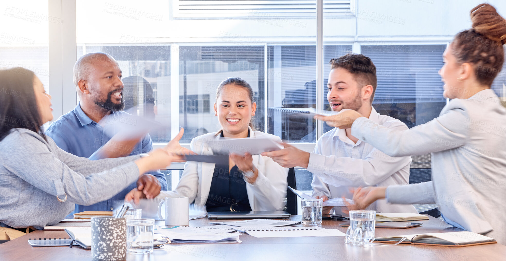 Buy stock photo Business people, documents and collaboration in team planning, schedule or strategy at office. Diverse group of employee workers passing paperwork in meeting for marketing or project plan on table