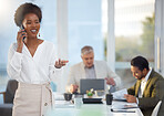 Business, black woman and phone call in meeting for schedule conversation or corporate discussion at office. Happy African American female leader talking on smartphone and explaining company strategy