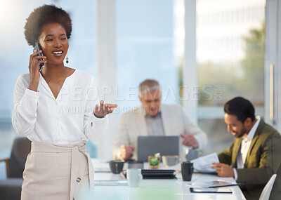 Buy stock photo Business, black woman and phone call in meeting for schedule conversation or corporate discussion at office. Happy African American female leader talking on smartphone and explaining company strategy