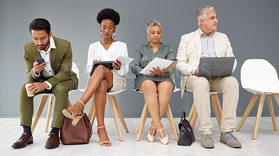 Buy stock photo Human resources, technology and business people waiting in line for a recruitment interview. Hiring, resume or cv with a man and woman employee sitting in an hr candidate row for opportunity