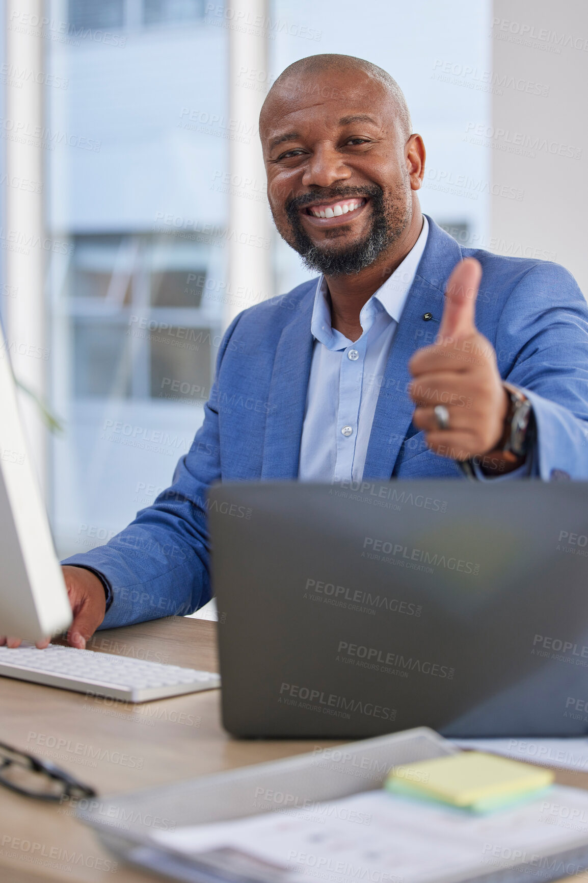 Buy stock photo Happy black man, laptop and thumbs up for winning, good job or success in marketing at the office desk. Portrait of African American male showing thumb emoji, yes sign or like in thanks by computer