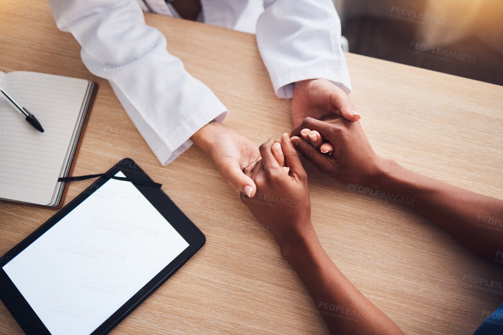 Buy stock photo Doctor holding hands, tablet mockup and patient consultation support, healthcare services and test results advice. Digital screen, product placement space and medical people empathy and helping above