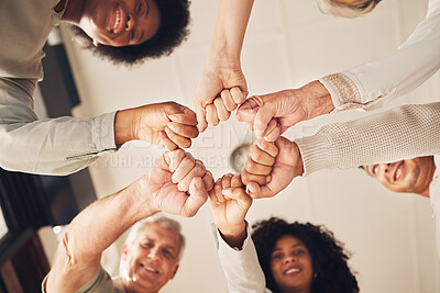 Buy stock photo Portrait, hands fist bump and business people happy for diversity, company solidarity or collaboration. Corporate group, mission teamwork and below view of design team building for community support