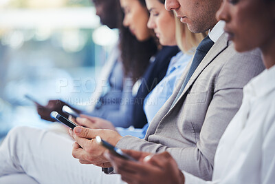 Buy stock photo Hands, phone and hr with a group of people waiting in line for an interview or meeting. Mobile, hiring and recruitment with business collegues sitting in a human resources candidate shortlist row