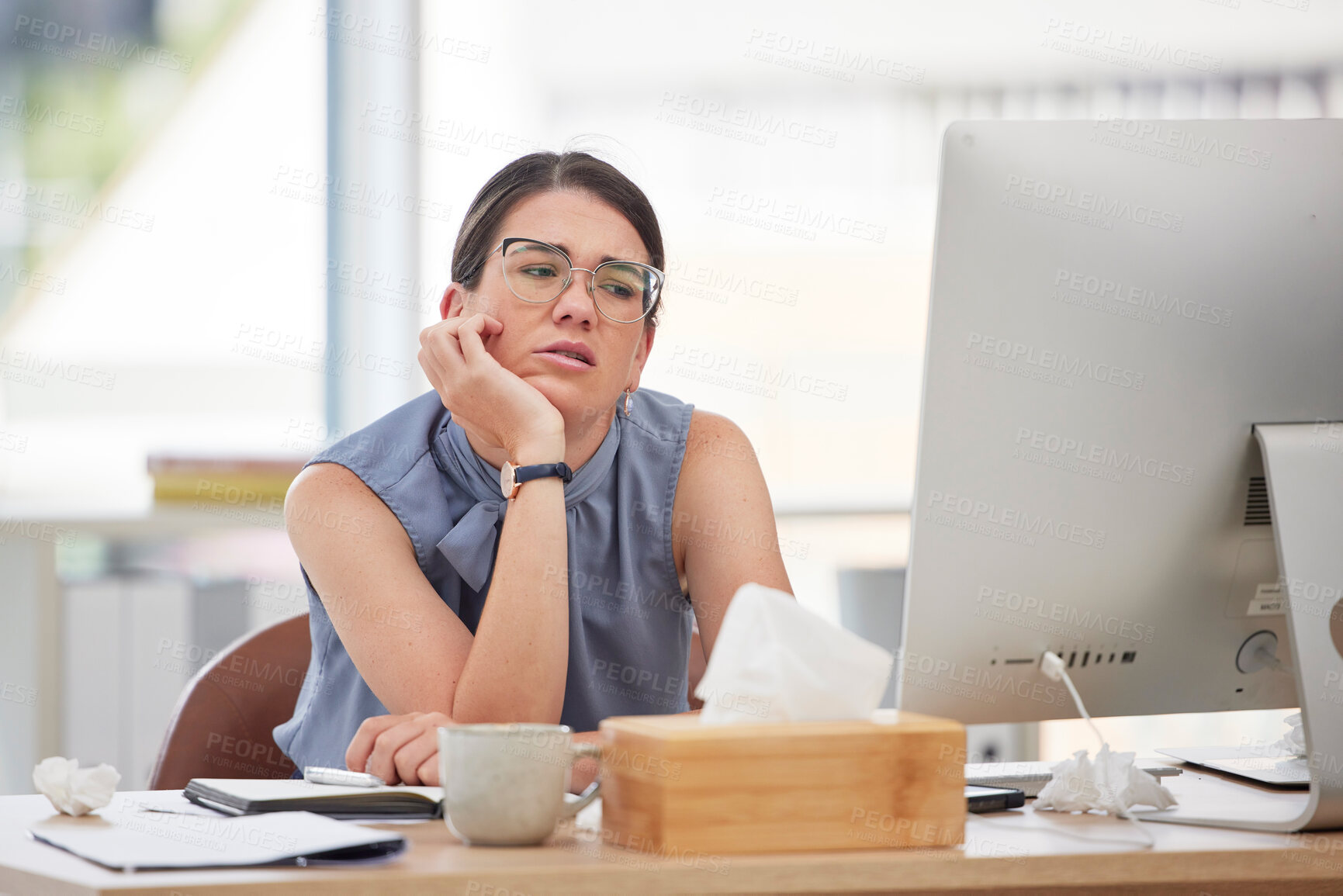 Buy stock photo Bored, burnout and a business woman using a computer at work while feeling annoyed or frustrated. Depression, sad and thinking with a female employee suffering from mental boredom in the office