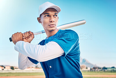 Sports, baseball and man with bat in action on field ready to hit ball in game, practice and competition. Fitness, motivation and male athlete outdoors for exercise, training and workout for match
