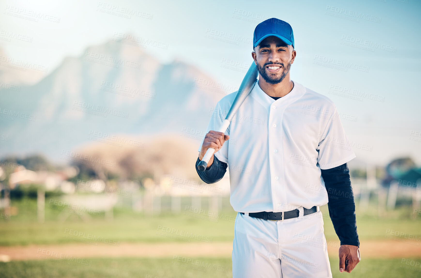 Buy stock photo Portrait, fitness and man with a bat, baseball and happiness on field, exercise and competition. Face, male athlete and player with sportswear, smile and confident guy for game, victory and mockup