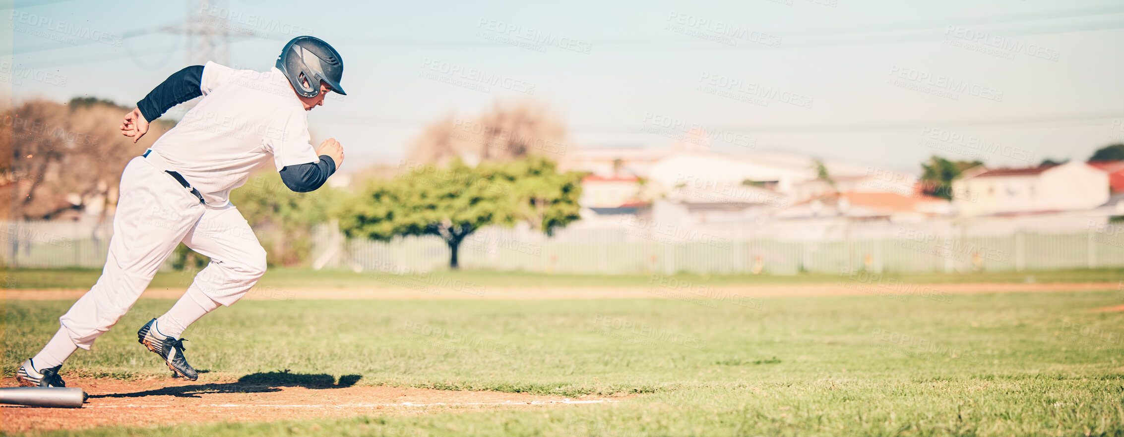 Buy stock photo Baseball, sports and fitness fast run of a sport player running on outdoor field in a game. Training, workout and exercise of a young athlete with focus and freedom from runner speed in the sun