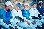 Baseball, friends and team of men in dugout, happy and watching training, match or game together. Diversity, men and athletic group bonding at a field for exercise, workout and fitness routine