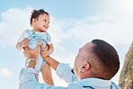 Care, playing and father holding a baby in nature for bonding, fun and quality time. Family, love and a dad playing with a child, laughing and enjoying outdoor environment together in summer