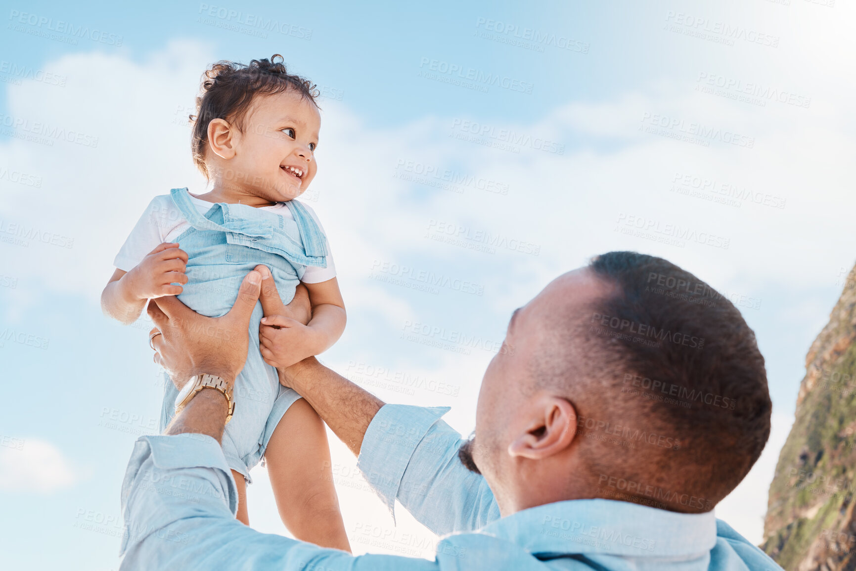 Buy stock photo Care, playing and father holding a baby in nature for bonding, fun and quality time. Family, love and a dad playing with a child, laughing and enjoying outdoor environment together in summer