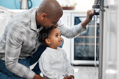 Buy stock photo Oven, father and girl baking, smile and quality time for fun, learning together and cooking. Love, dad and female kid in kitchen, happiness or loving for child development, bonding or playful in home