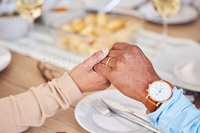 Buy stock photo Holding hands, people and praying thanks on food, lunch or worship at dinner table. Closeup, prayer and eating together in religion, trust or appreciation of christian support, respect or care of god