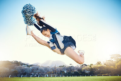 Buy stock photo Sports, performance and woman cheerleader jumping while performing a routine on the field at an arena. Fitness, exercise and female doing a trick or skill while training or practicing for the show.