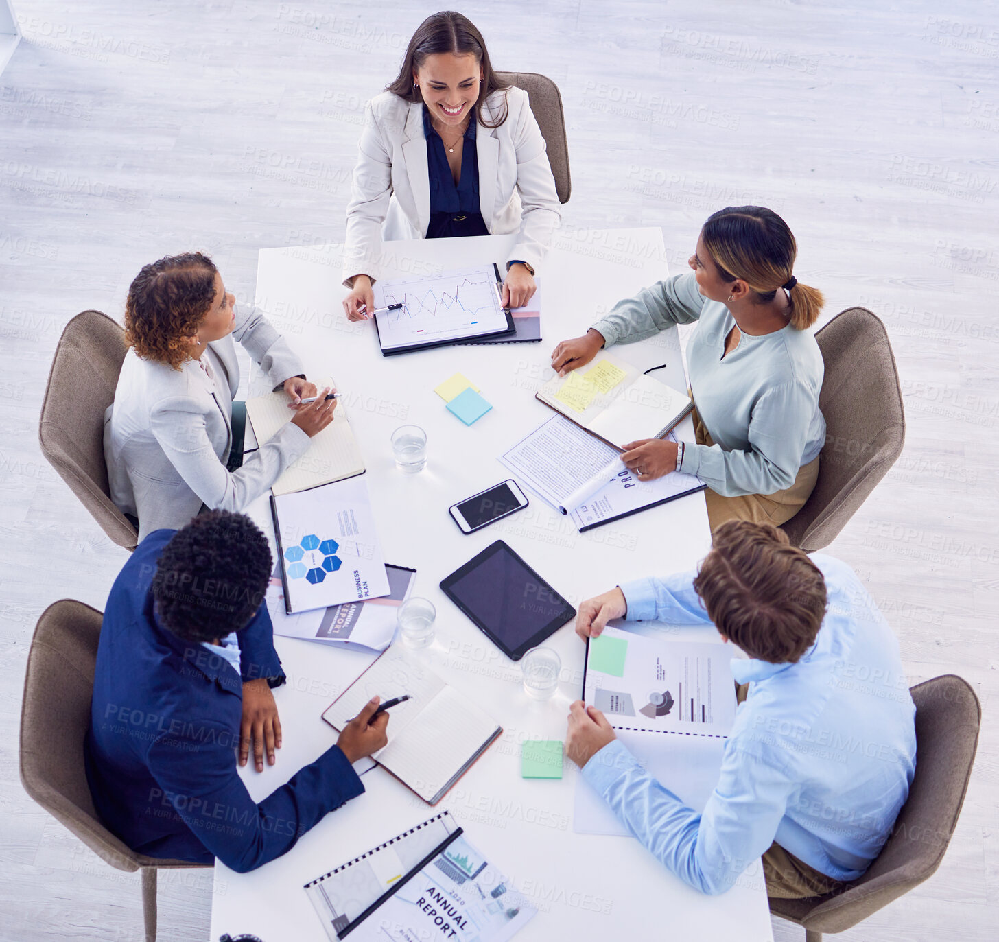 Buy stock photo Teamwork, top view and business people in meeting with documents, paperwork and annual report. Collaboration, office and group of workers with infographics, financial review and graphs for planning