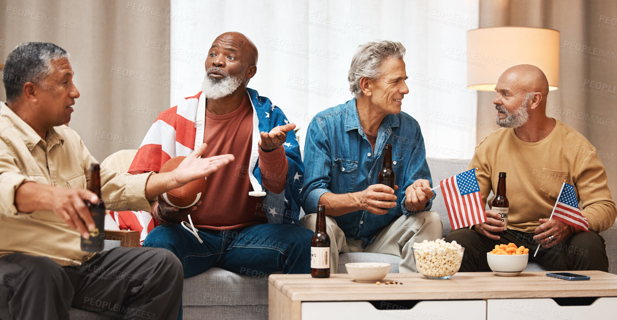 Buy stock photo Senior men, friends or watching soccer with beer on table talking, bonding or debate on sports in USA. Fun elderly American people with flags or popcorn for a match game together at home together