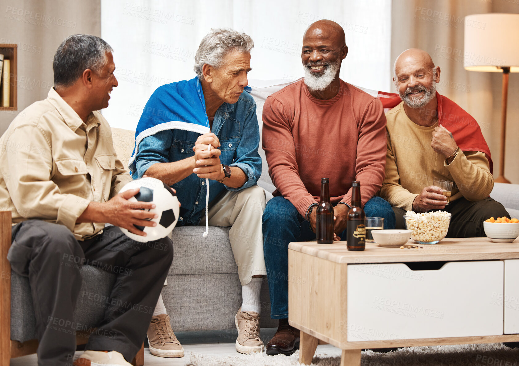 Buy stock photo Senior, friends or watching soccer with beer on table in bonding or debate on sports in France, Paris. Happy elderly French people with flags or popcorn for a fun match game together at home together