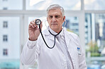Doctor, stethoscope or listening man in hospital trust, healthcare wellness or life insurance support. Mature, medical or cardiology equipment for clinic worker, surgery expert or lungs professional
