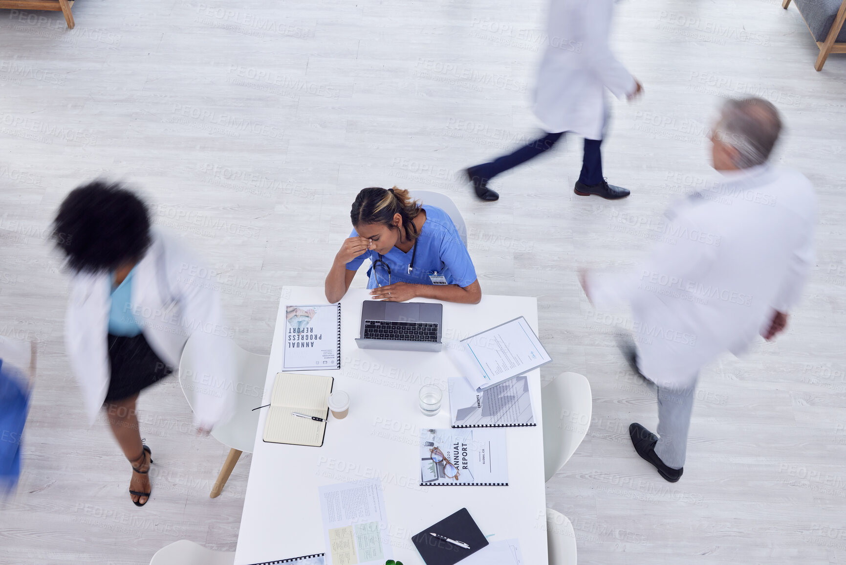 Buy stock photo Nurse, woman or stress headache on laptop in busy hospital research, medicine planning or medical life insurance. Anxiety, migraine or tired healthcare worker on technology, top view or doctors blur