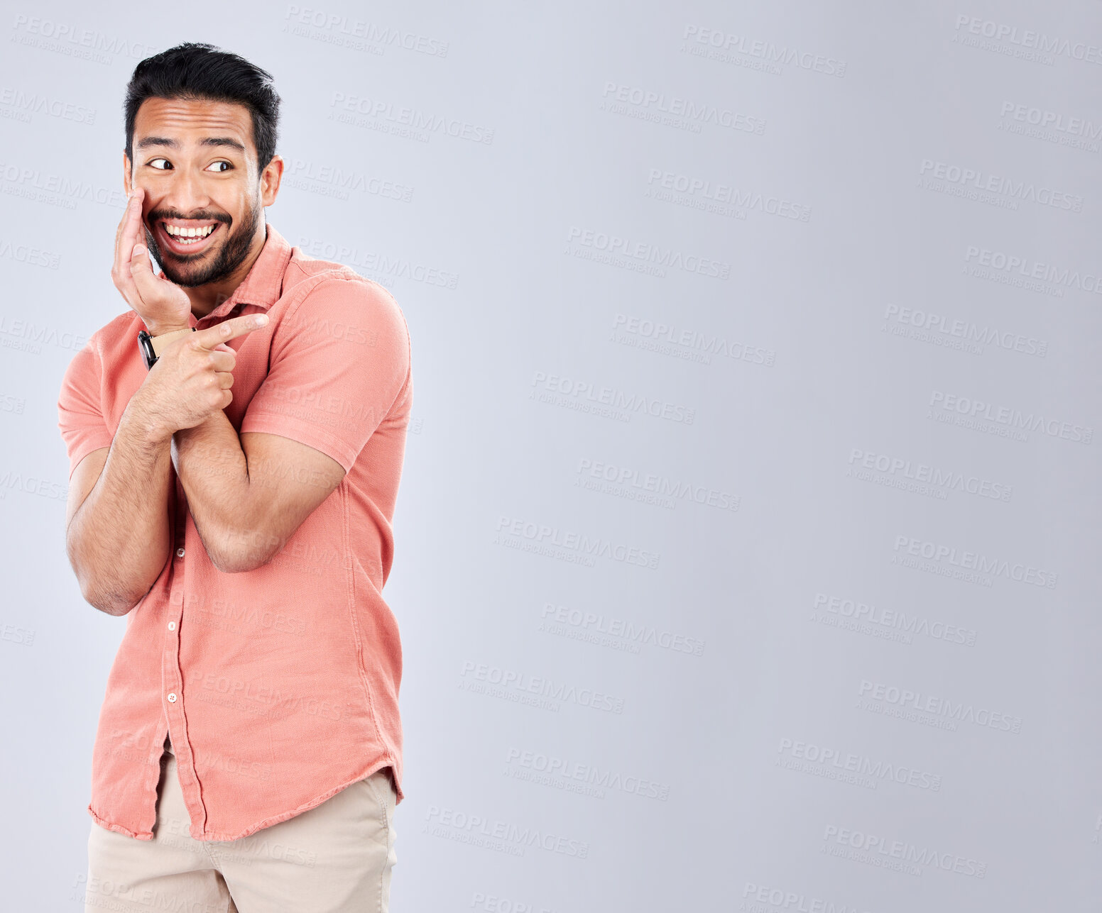 Buy stock photo Mockup, gossip and man with a secret in studio for whisper, drama or rumor against grey background. Asian, model and guy sharing, whispering and sneaky, telling and mysterious while advertising space