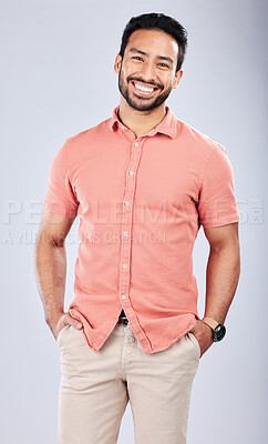 Fashion, happy and portrait of a man in a studio with a casual, trendy and  cool outfit. Happiness, smile and full length of a male model from Puerto  Rico with style posing