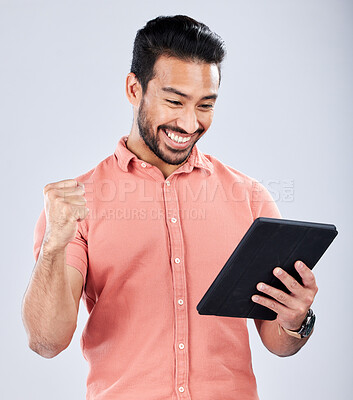 Buy stock photo Happy asian man, tablet or success fist on isolated studio background for financial growth, stock market deal or future security. Smile, cheering or trader with winner hands, technology or loan app