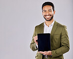 Asian man, portrait or showing tablet screen on isolated studio background of finance mockup, fintech logo or product placement. Smile, happy or businessman on technology, stock market or loan deal