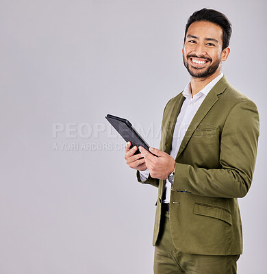 Buy stock photo Portrait, tablet and mockup with a business man in studio on a gray background for research or marketing. Internet, search and advertising with a male employee standing on blank mock up space