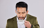 Coffee, smell and man in studio drink for energy, caffeine boost and relaxing for cafe breakfast. Happiness, aroma scent and calm male with latte, cappuccino and beverage in cup on white background